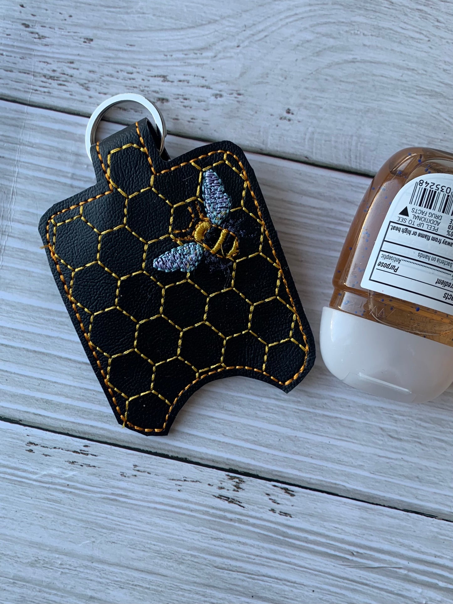 Bee hand sanitizer holder
