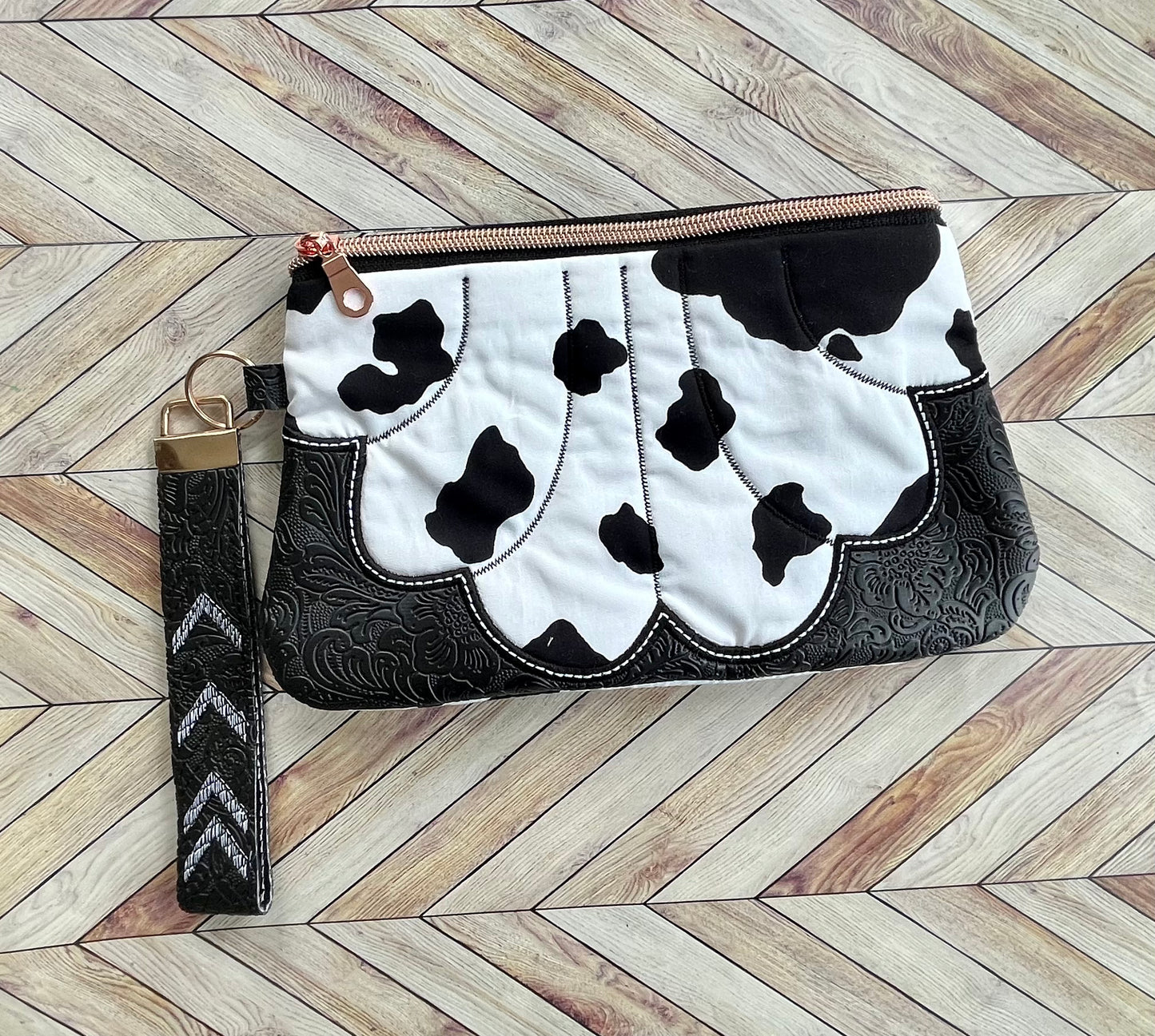 Cow print wristlet